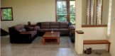 Open Space Waterfront Home Living Room - Belize Real Estate